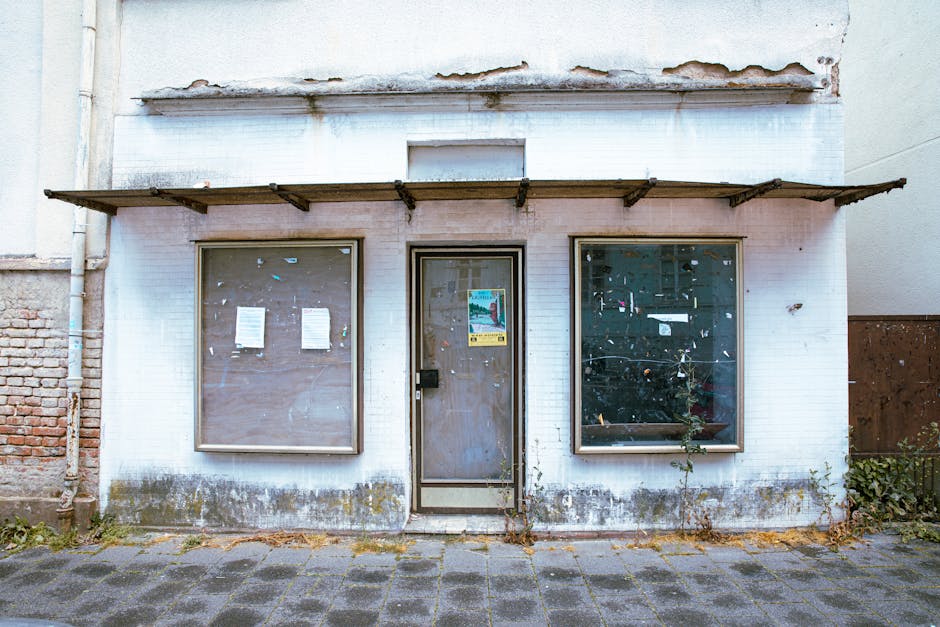 A weathered facade of an abandoned building in Frankfurt showcases urban decay.